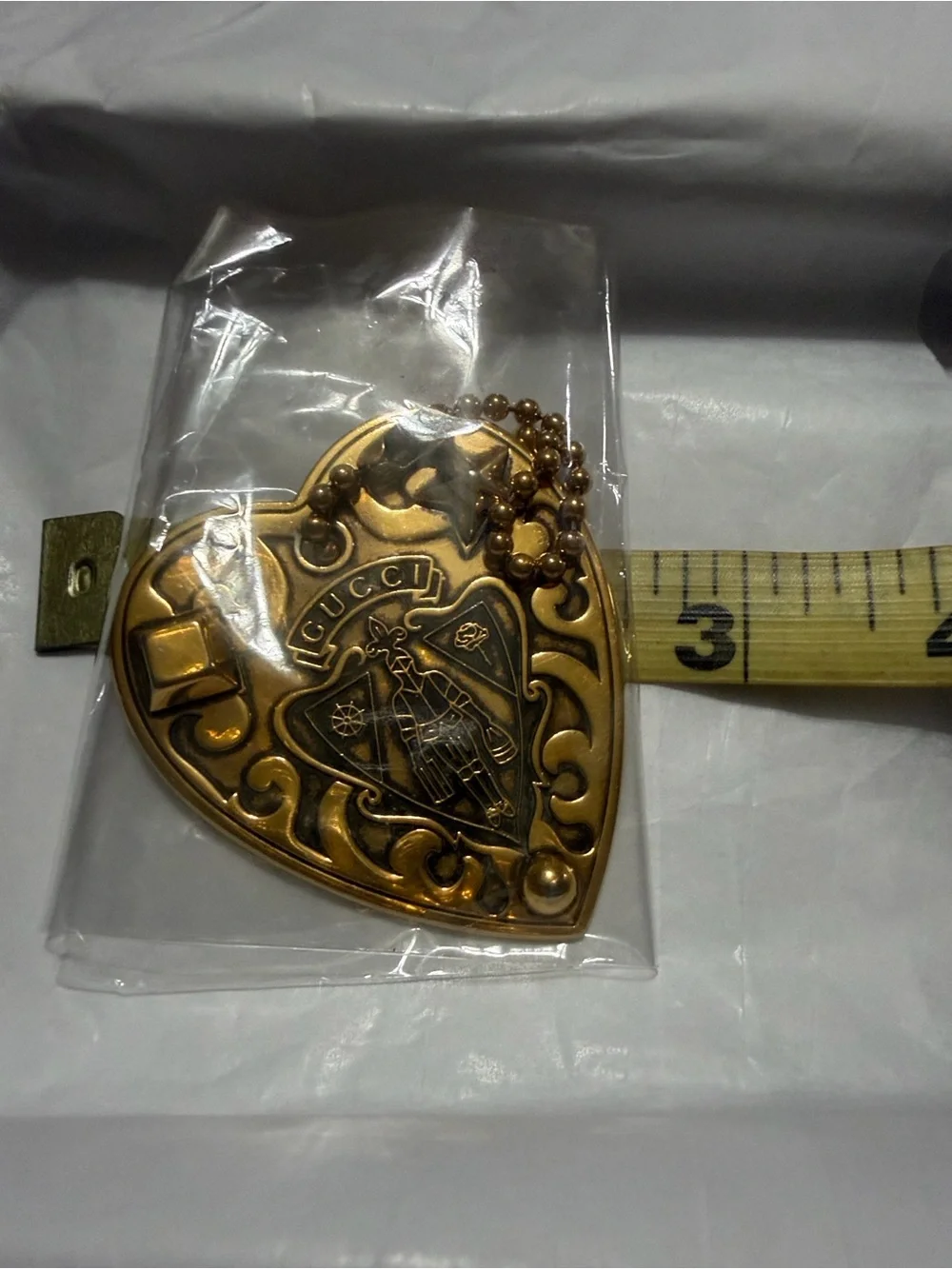 Vintage Gucci Gold Heart Pendant Keychain with Engraved Crest